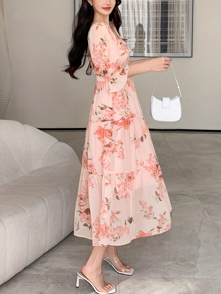 Effortlessly stylish Newness Summer Bloom Floral Midi Dress in a lightweight and flowy silhouette, perfect for any summer occasion.