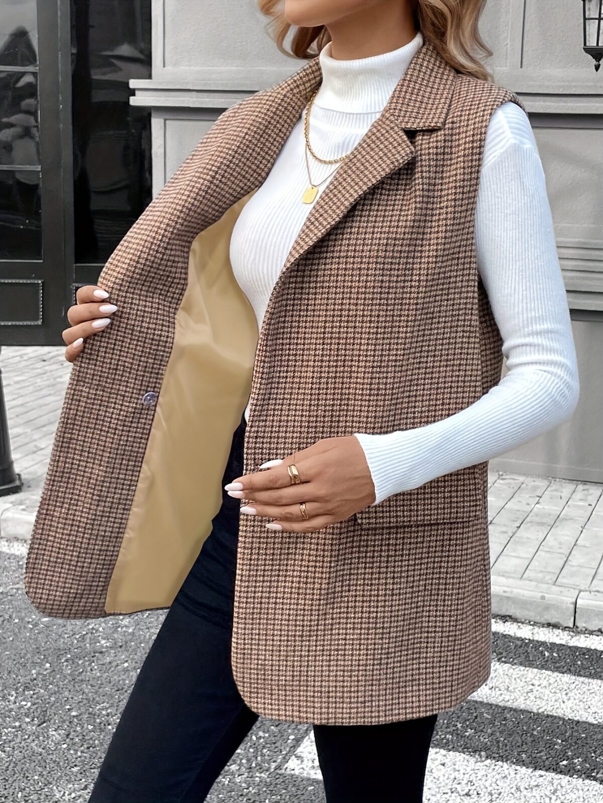 Newness City Chic Houndstooth Sleeveless Suit Jacket A stylish houndstooth sleeveless jacket perfect for layering over dresses or blouses during FallWinter Versatile and chic