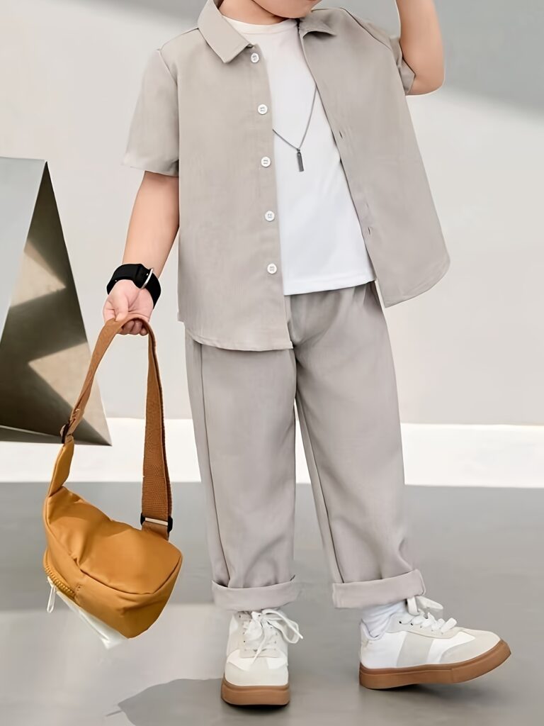 Stylish boys' solid color shirt and pants set, perfect for spring and summer. Lightweight and comfortable, ideal for warm weather.