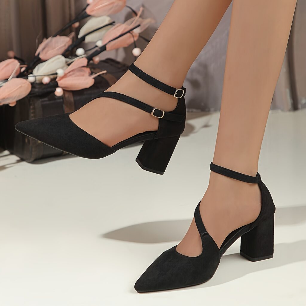 Newness Milan Pointed Toe Pumps in elegant black leather, showcasing their pointed toe and comfortable silhouette. Perfect for work or a night out.
