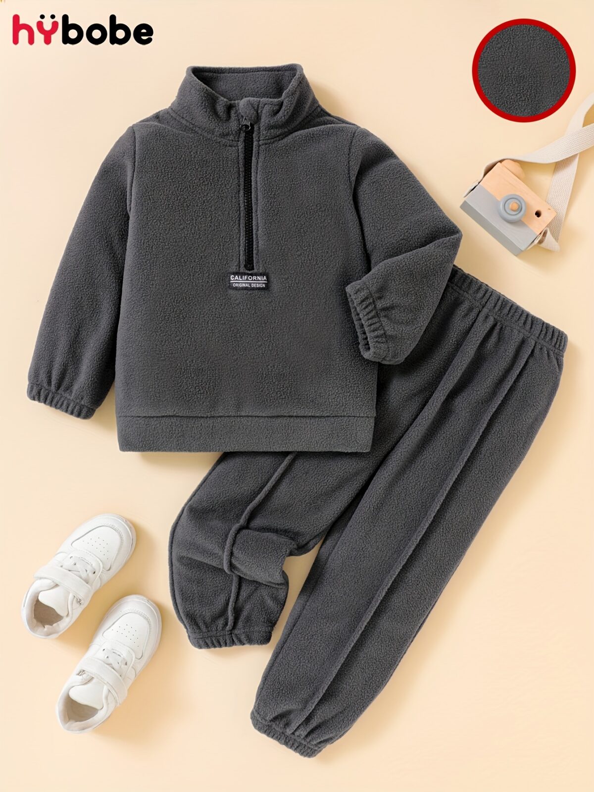 Newness Cozy Comfort Boys Winter Fleece Set A stylish and cozy two piece fleece set for boys perfect for keeping warm during winter The image shows a boy wearing the set showcasing its soft fleece fabric and trendy design