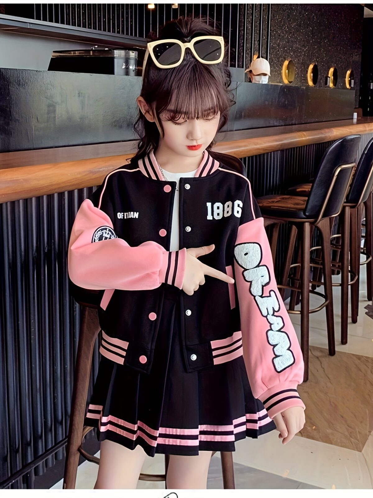 Stylish Newness Girls Varsity Outfit A trendy letter block cardigan and pleated skirt in a sporty chic design