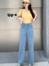 Glacier blue embroidered wide leg jeans from Newness showcasing intricate embroidery and a flattering wide leg silhouette