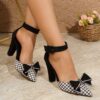 Chic black and white houndstooth plaid bow pumps Mary Jane style pointed toe comfortable block heel Dubai design