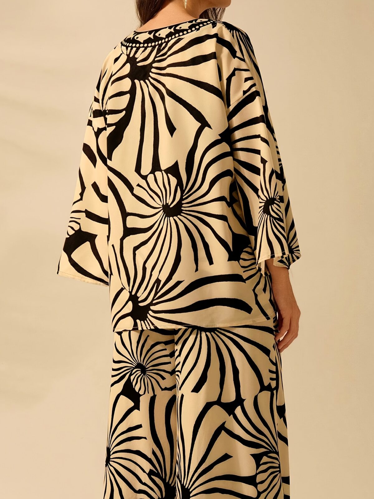 Effortlessly chic Casablanca Geometric Print Kimono from Newness perfect for summer Features a striking geometric print and relaxed fit