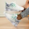 Womens Cloudwalk Breathable Casual Sneakers by Newness in white showcasing the breathable fabric and comfortable EVA sole Modern design for all day wear