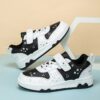 Stylish white and black star speckled sneakers for girls perfect for casual wear Breathable PU upper non slip TPR sole and EVA cushioned insole for all day comfort