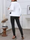 The Newness Milan Patchwork Casual Suit in a chic modern design perfect for spring and fall The image shows a full body view of the suit highlighting the unique patchwork details