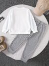 Adorable boys hoodie and sweatpants set featuring a stylish pencil pattern hoodie and comfortable striped sweatpants Perfect for school playdates or cozy days at home