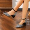 Newness Parisian Chic Houndstooth Block Heels Elevate your style with these comfortable and chic black and white houndstooth block heels perfect for any occasion