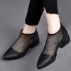 Newness Milan Chunky Black Booties Pointed toe booties with breathable mesh and a chunky mid block heel
