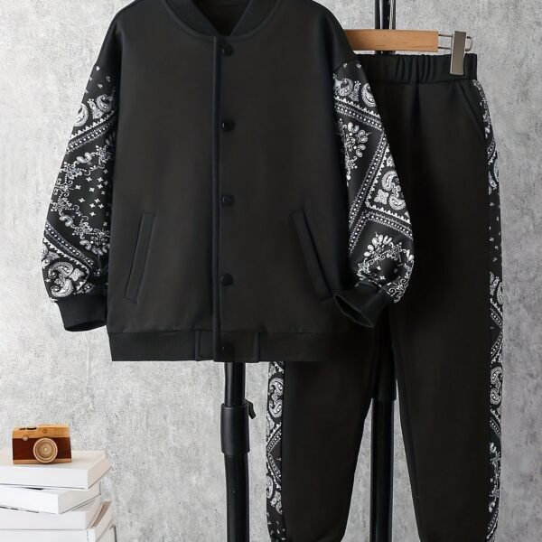 Stylish boys geometric pattern tracksuit set in a comfortable polyester blend perfect for FallWinter Machine washable for easy care From Newness