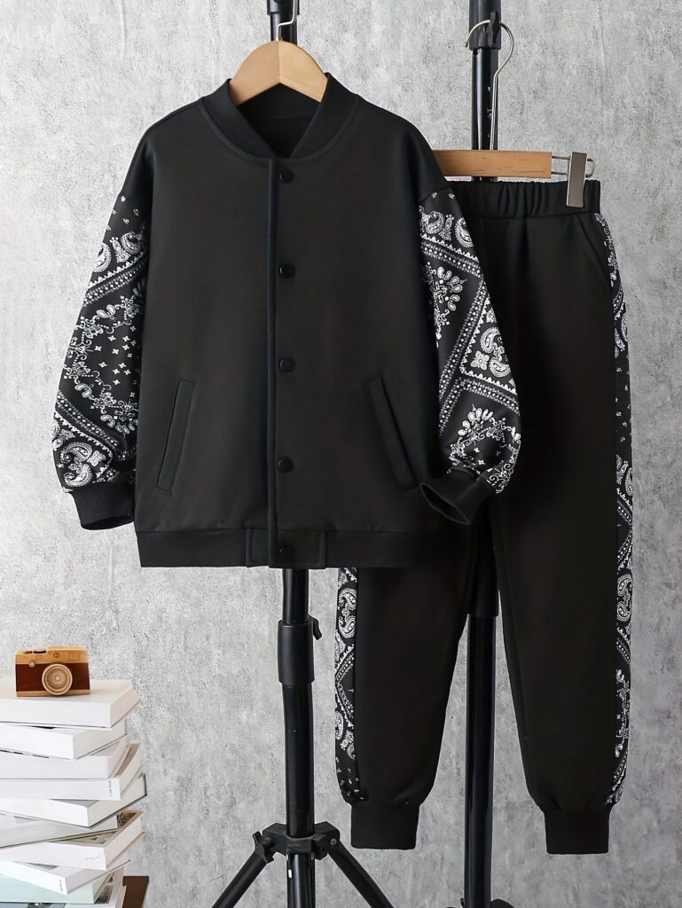 Stylish boys' geometric-pattern tracksuit set in a comfortable polyester blend, perfect for Fall/Winter. Machine washable for easy care. From Newness.