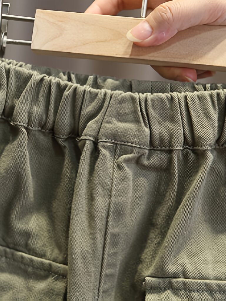 Stylish boys' cargo pocket set in a comfortable cotton blend, perfect for playtime and adventures. The outfit features multiple pockets for carrying treasures.