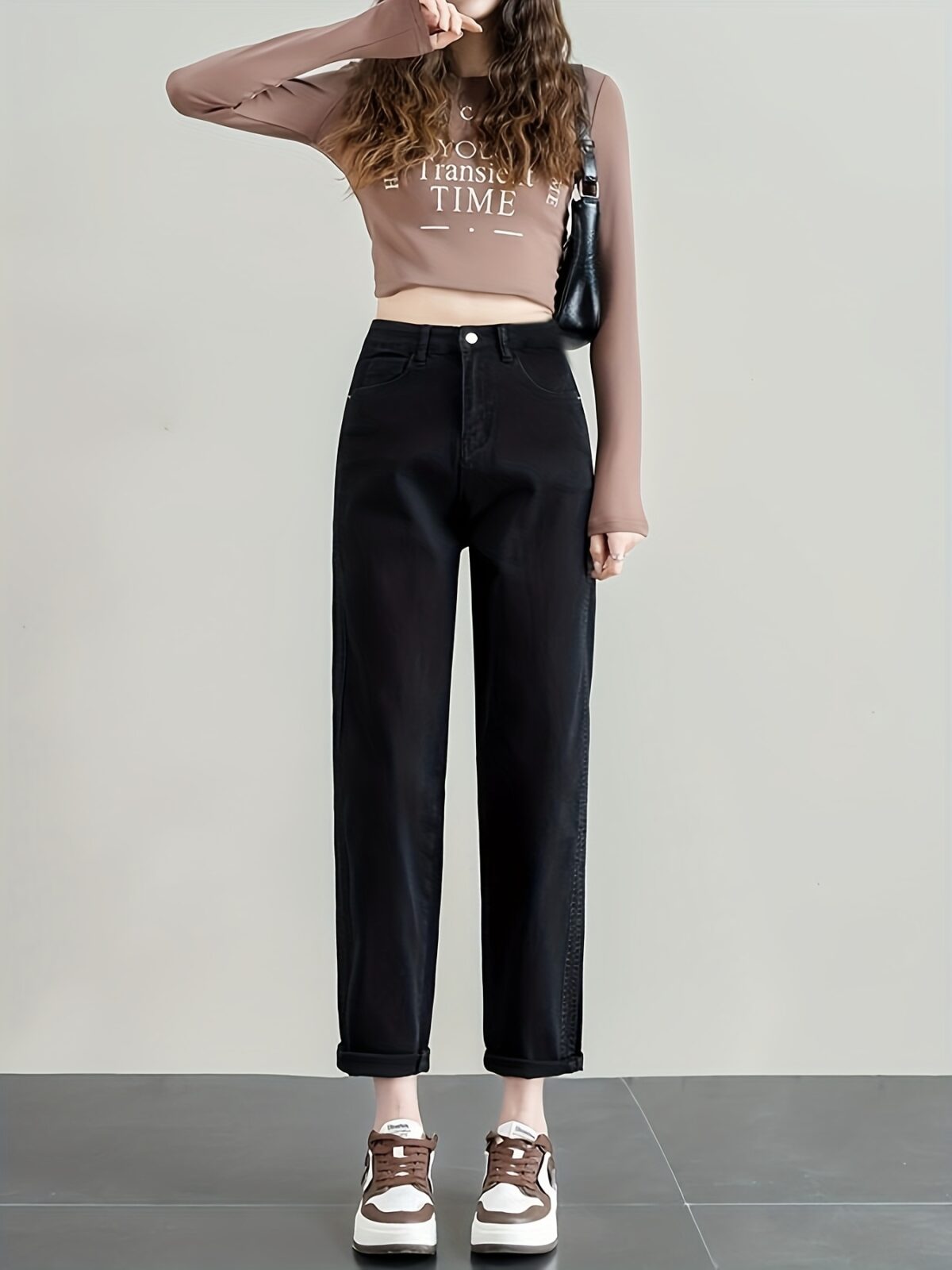 Model wearing Newness Cairo Nights High Waisted Harem Pants showcasing the comfortable flowing fabric and chic effortless style