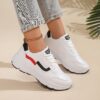 Newness City Chic White Accent Sneakers Modern white sneakers with stylish accents perfect for any occasion