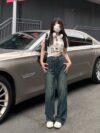 Stylish Modern Muse Geometric Wide Leg Jeans by Newness Dubai made featuring a flattering geometric print and wide leg silhouette Perfect for all seasons