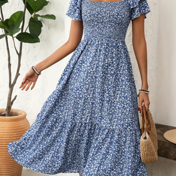 Casablanca Floral Print Dress from Newness. A flattering, breezy dress perfect for spring and summer.