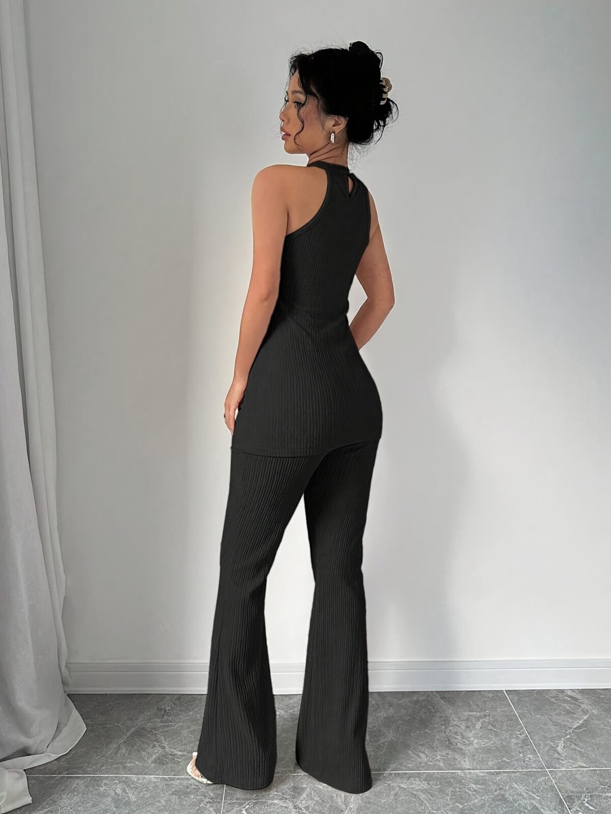 Effortless Chic Sleeveless Knit Set in luxurious polyester Flattering silhouette perfect for any occasion