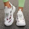 Newness Bloomsbury Floral Print Sneakers Comfortable and breathable floral print sneakers perfect for any occasion