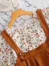 Newness Whimsical Meadow Floral Print Dress Set A charming autumnal dress and skirt set in a delightful floral print