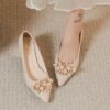 Newness Celestial Sparkle Floral Rhinestone Pumps Elevate your style with these dazzling floral rhinestone pumps perfect for weddings and special occasions Close up showcasing intricate floral detail and sparkling rhinestones