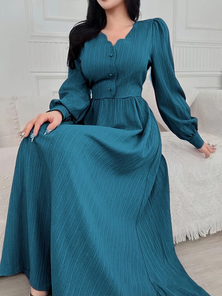 The Azure Dream Fit and Flare Maxi Dress by Newness in a stunning azure blue. This elegant maxi dress features a flattering fit and flare silhouette, perfect for any occasion.