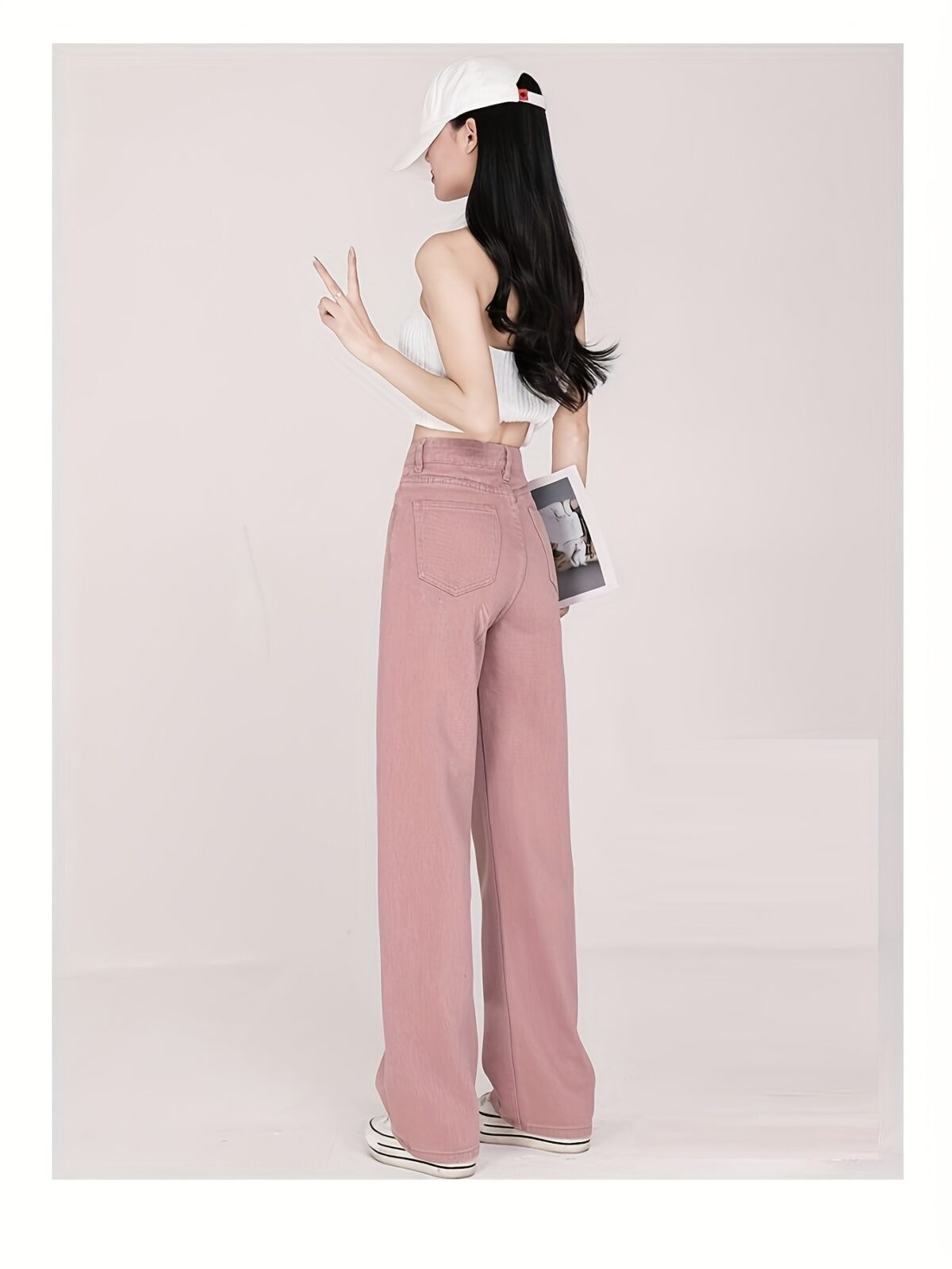 Newness Milan High Waisted Straight Leg Jeans Flattering fit timeless style A model wears the jeans