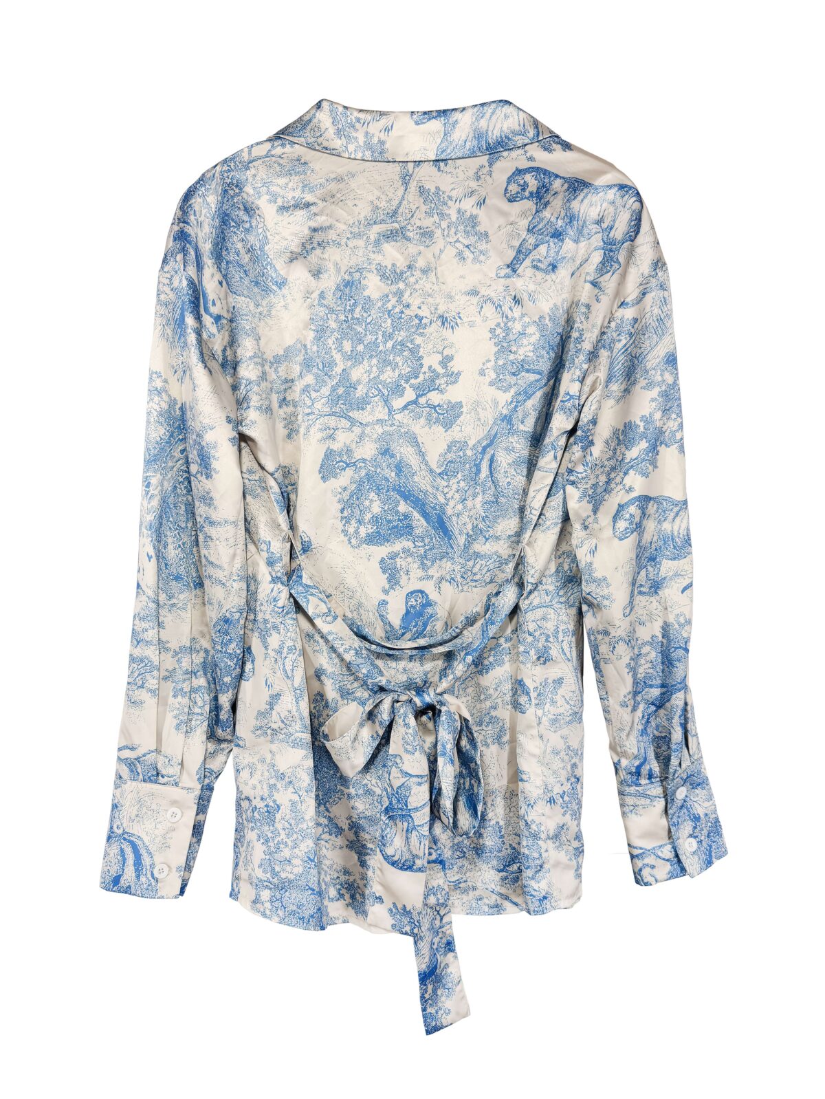 Effortlessly chic Riviera Romance floral print two piece set featuring a long sleeve shirt and wide leg pants perfect for all seasons