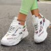 Newness Bloomsbury Floral Print Sneakers Comfortable and breathable floral print sneakers perfect for any occasion