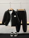 Stylish boys tracksuit set in navy blue with white stripes perfect for active play or casual wear Features a comfortable long sleeve jacket and matching pants