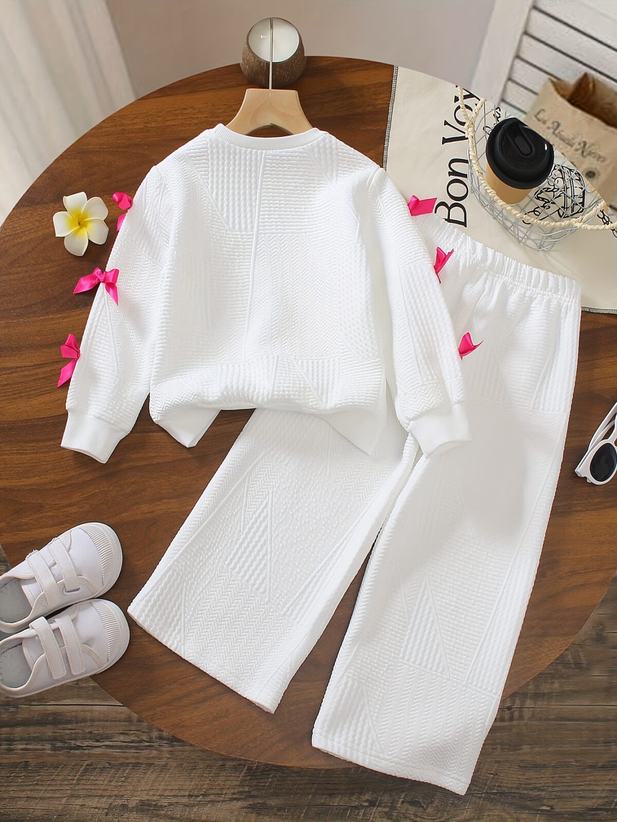 Adorable girls two piece autumn outfit cozy knit top and loose fitting pants perfect for fall adventures Dubai design