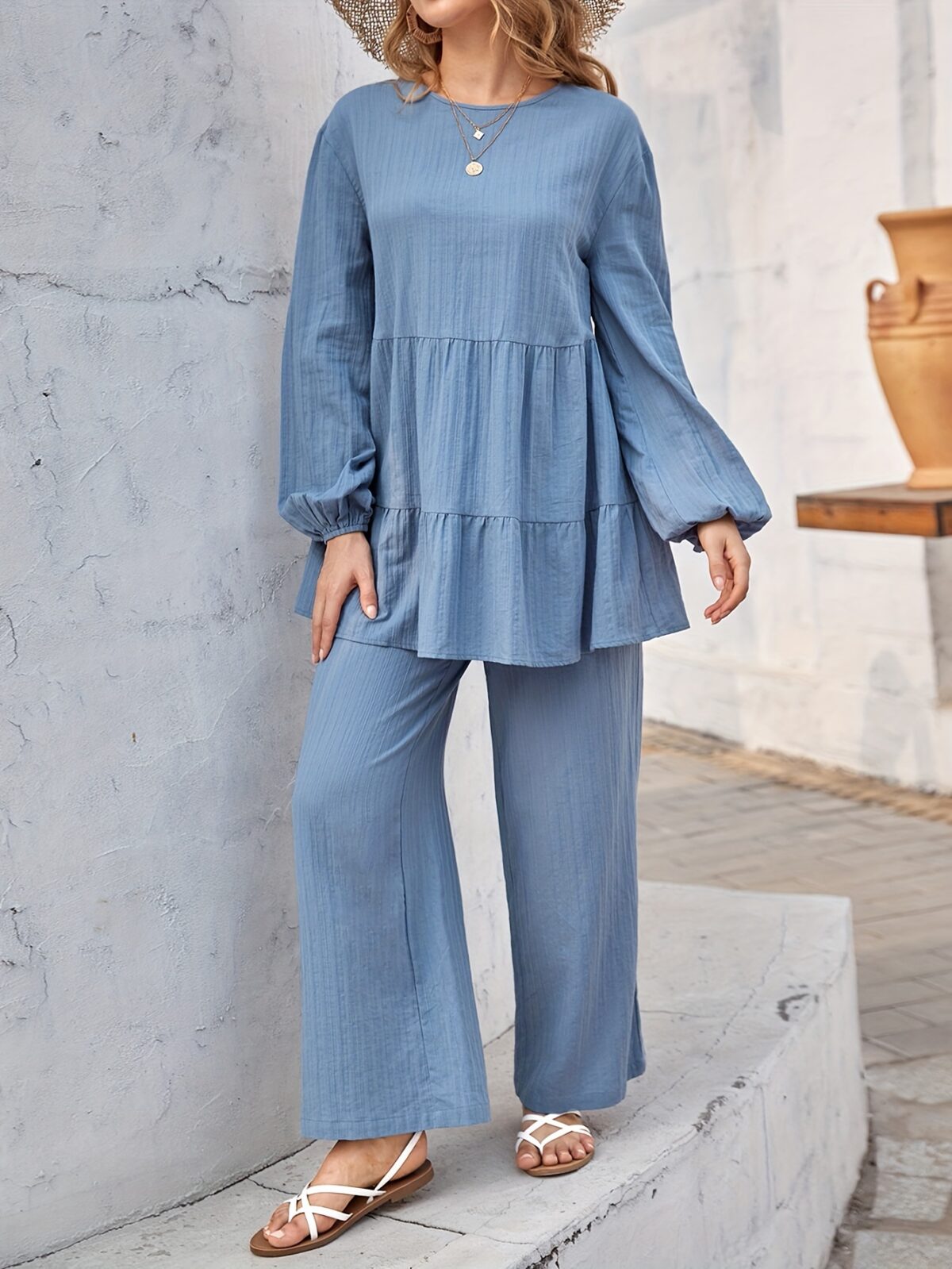 Newness Dahlia Ruffled Two Piece Set A stylish and comfortable two piece outfit featuring a ruffled design