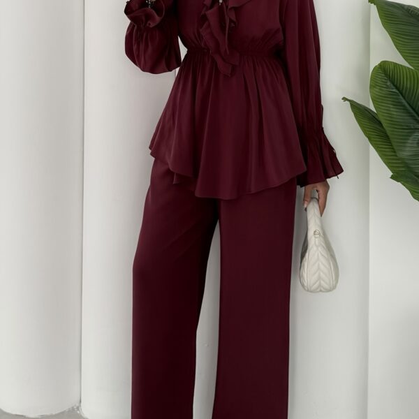 The Newness Milan Two Piece Pant Set in luxurious polyester A sophisticated and stylish two piece outfit perfect for any occasion