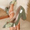 Sage Blossom Pointed Block Heel Pumps by Newness Chic pointed toe pumps with a comfortable block heel perfect for any occasion