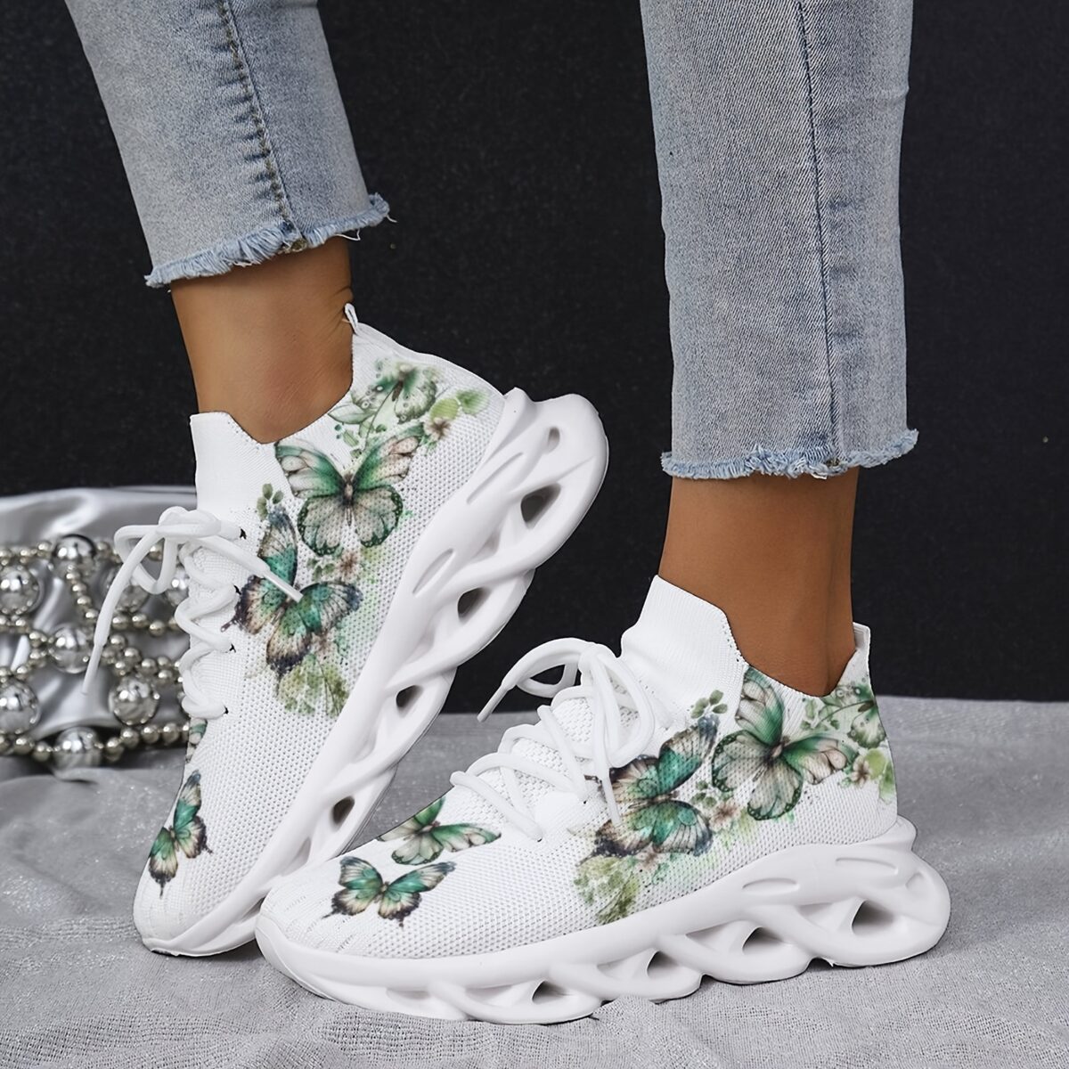 Newness Whimsical Butterfly Print Sneakers Chic and comfortable sneakers featuring a playful butterfly print perfect for any occasion