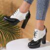 Elegant black lace up high heels with a block heel and ankle strap