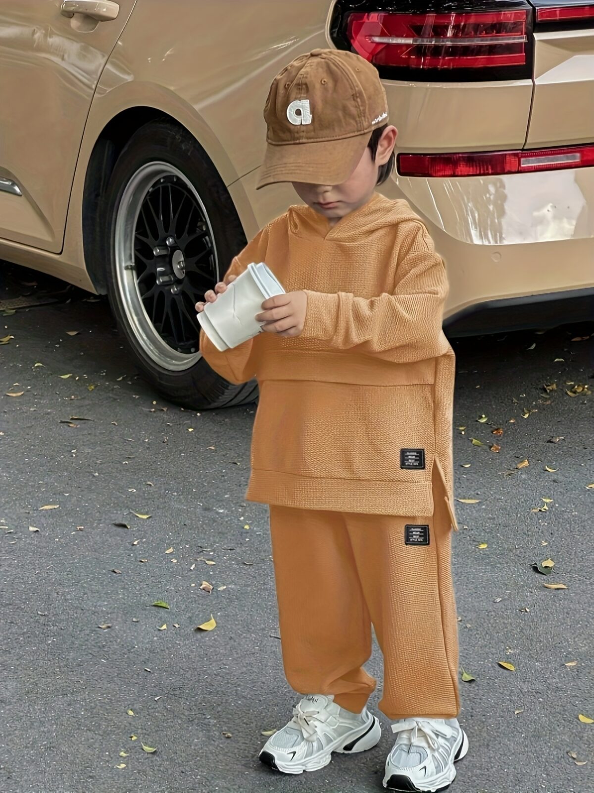 Newness Cozy Champ Boys Waffle Knit Set in soft waffle knit fabric featuring a hooded top and pants perfect for winter adventures