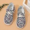 Adorable girls heart pattern loafers in a soft breathable fabric Perfect for everyday wear these slip on shoes offer both comfort and style