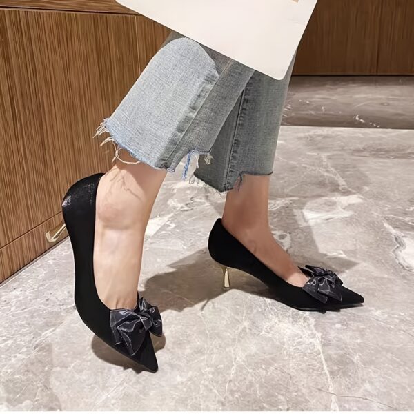 Golden stiletto heels with elegant bow, featuring a comfortable insole and slip-resistant sole, perfect for weddings and events.