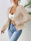 Flattering beige blazer for women featuring a chic asymmetrical hem perfect for both casual and formal occasions