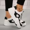 Newness Monochrome Magic Heart Pattern Sneakers Stylish monochrome heart pattern sneakers offering sporty comfort