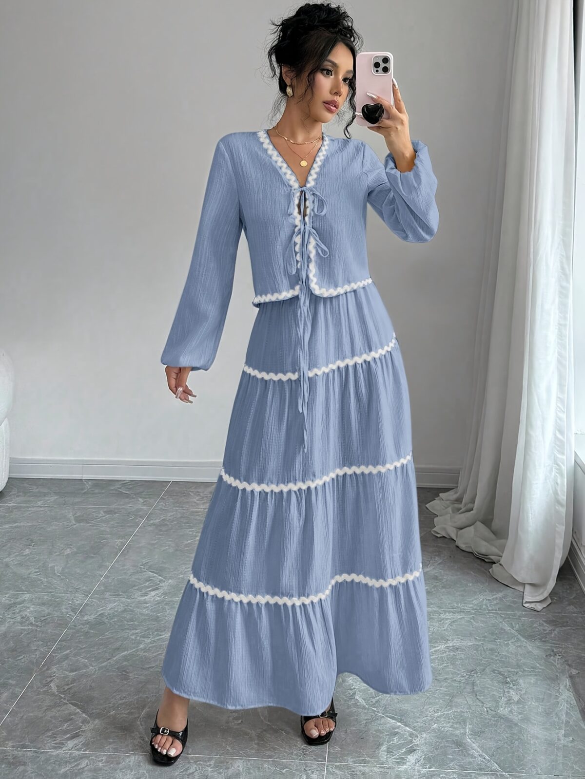 Effortlessly chic Casablanca Tiered Maxi Skirt Set from Newness Model showcasing the complete set featuring a flowing maxi skirt with tiers and a coordinating top
