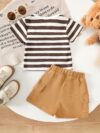 Adorable baby boy wearing Newness Cozy Cub Two Piece Set featuring a striped top with bear embroidery and matching shorts Perfect for spring and summer