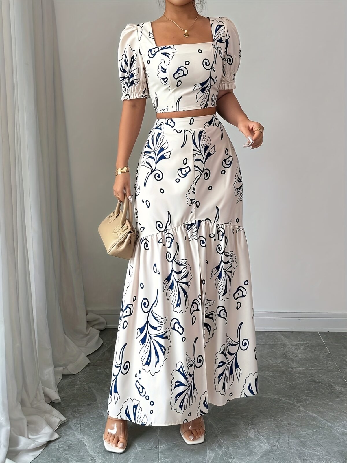 Effortlessly chic Casablanca Floral Print Skirt Set from Newness perfect for spring and summer Features a flowing skirt and coordinating top in a vibrant floral print