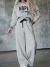 The Newness Effortless Chic Letter Print Lounge Set A stylish and comfortable two piece loungewear set featuring a relaxed modern silhouette and a chic letter print