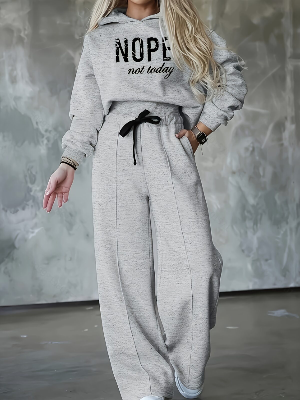 The Newness Effortless Chic Letter Print Lounge Set A stylish and comfortable two piece loungewear set featuring a relaxed modern silhouette and a chic letter print