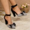 Chic black and white houndstooth plaid bow pumps Mary Jane style pointed toe comfortable block heel Dubai design