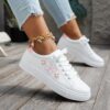 Newness Aria Butterfly Lace Up Sneakers in white showcasing delicate butterfly detailing and comfortable design Perfect for any occasion