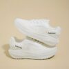 Stylish and comfortable womens breathable mesh sneakers in white showcasing the airy mesh upper and modern design Perfect for everyday wear or workouts
